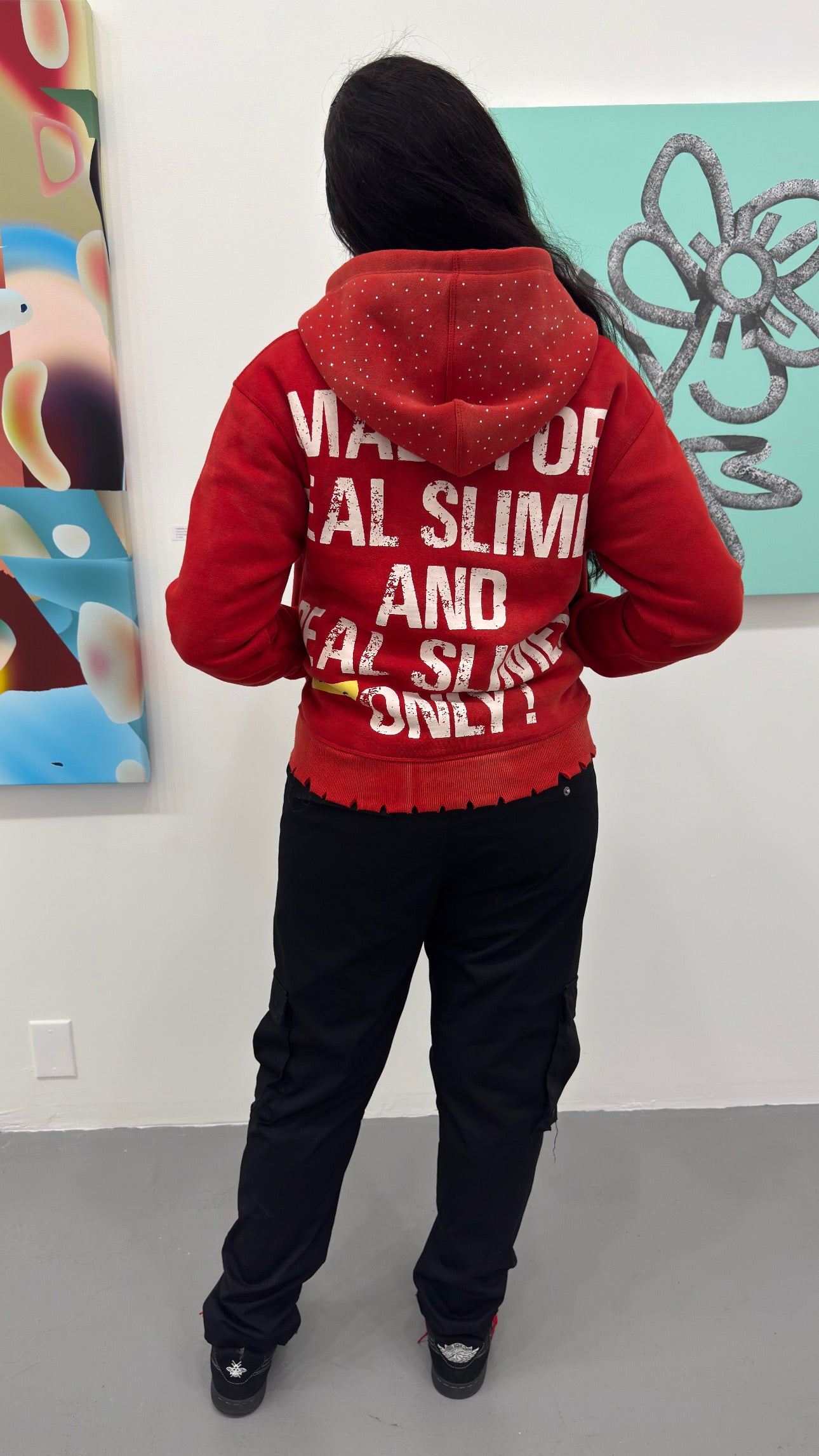 Red “Members Only” zip-up