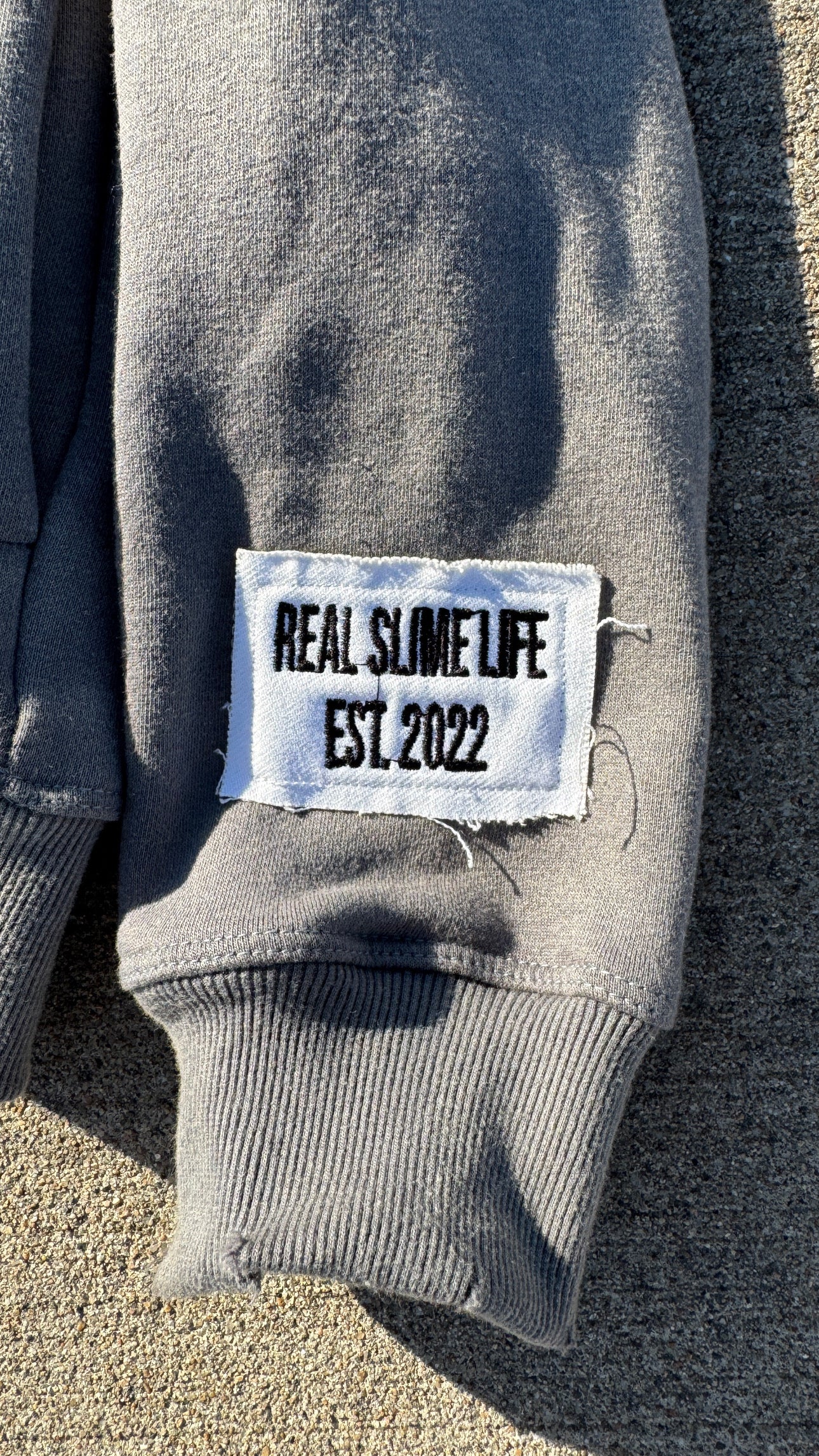 Gray “Members Only” zip-up