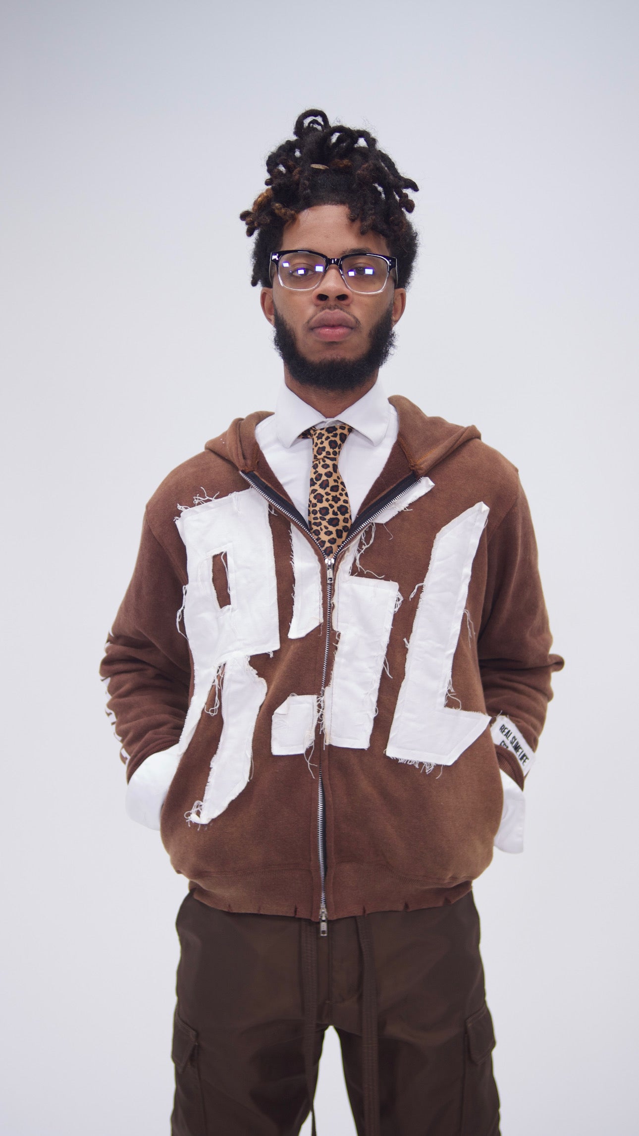 Brown “Members Only” zip-up