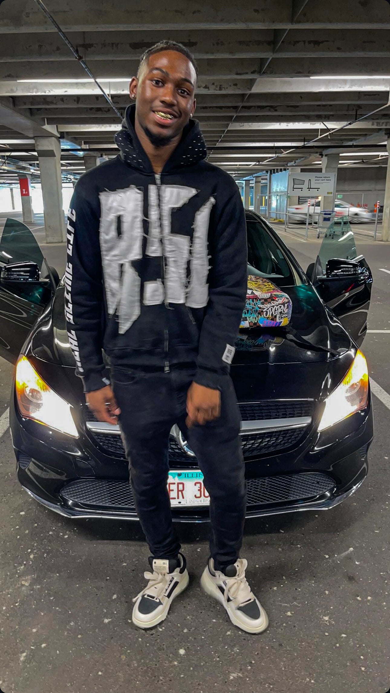 Black “Members Only” zip-up