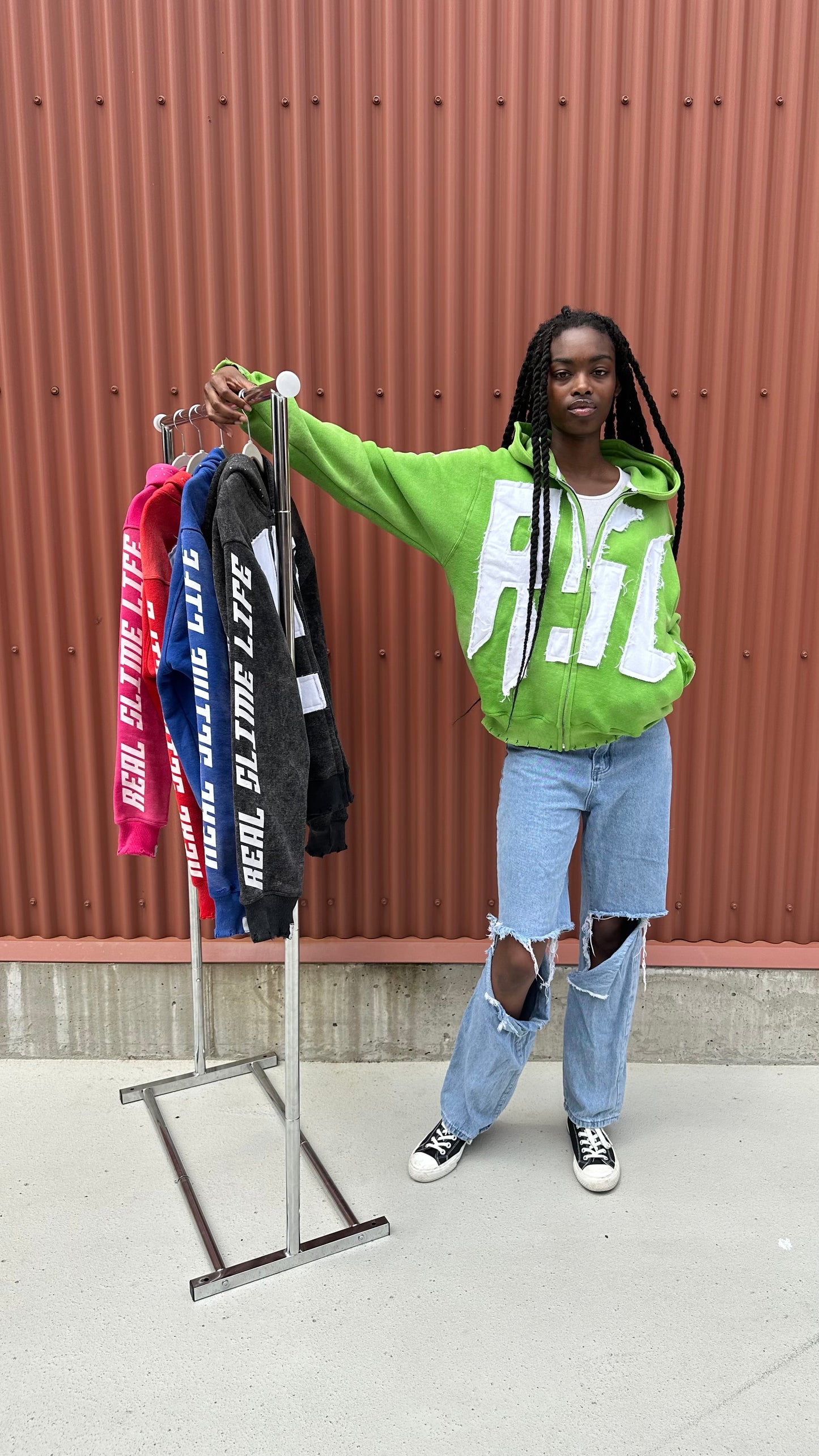 Green “Members Only” zip-up