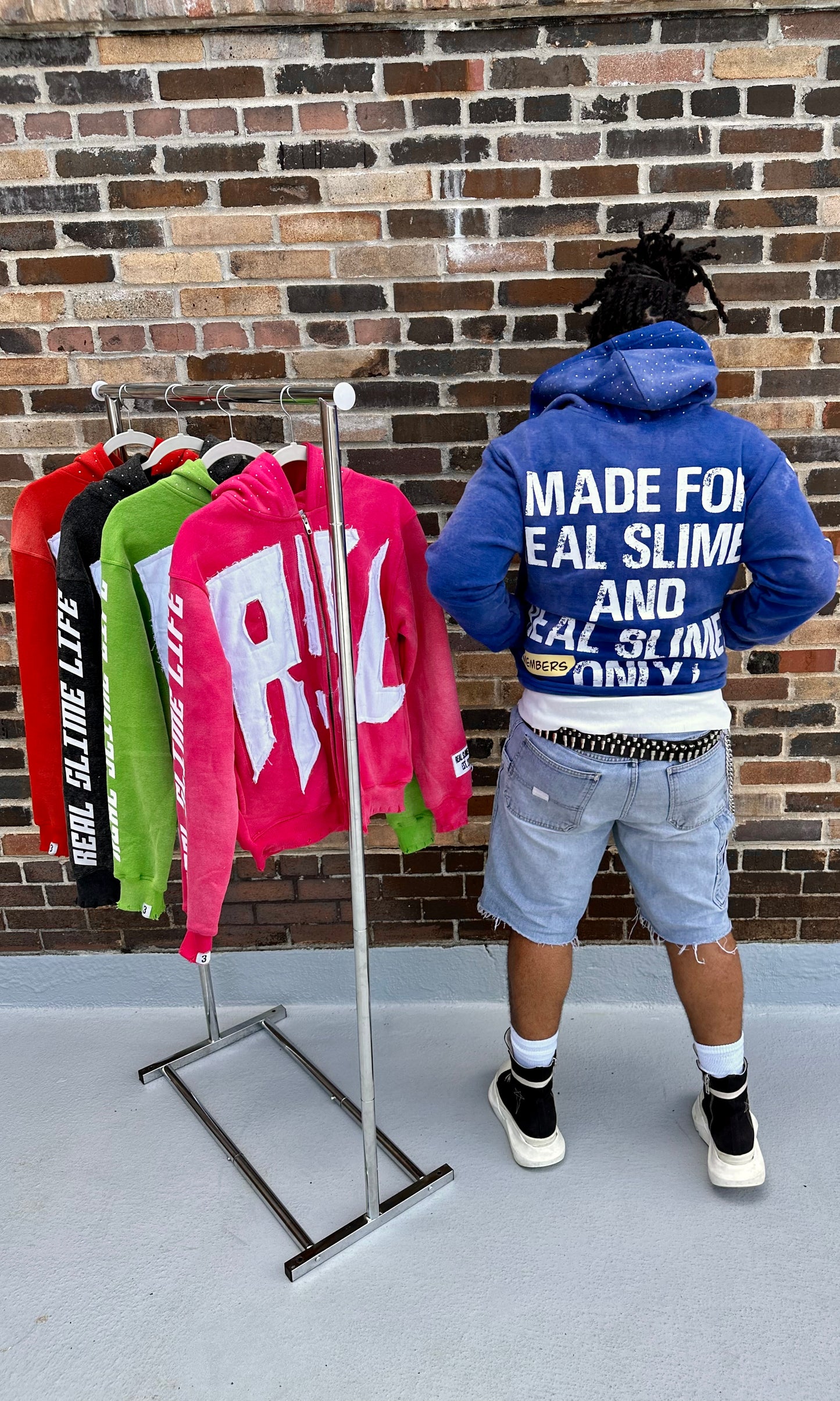 Blue “Members Only” zip-up