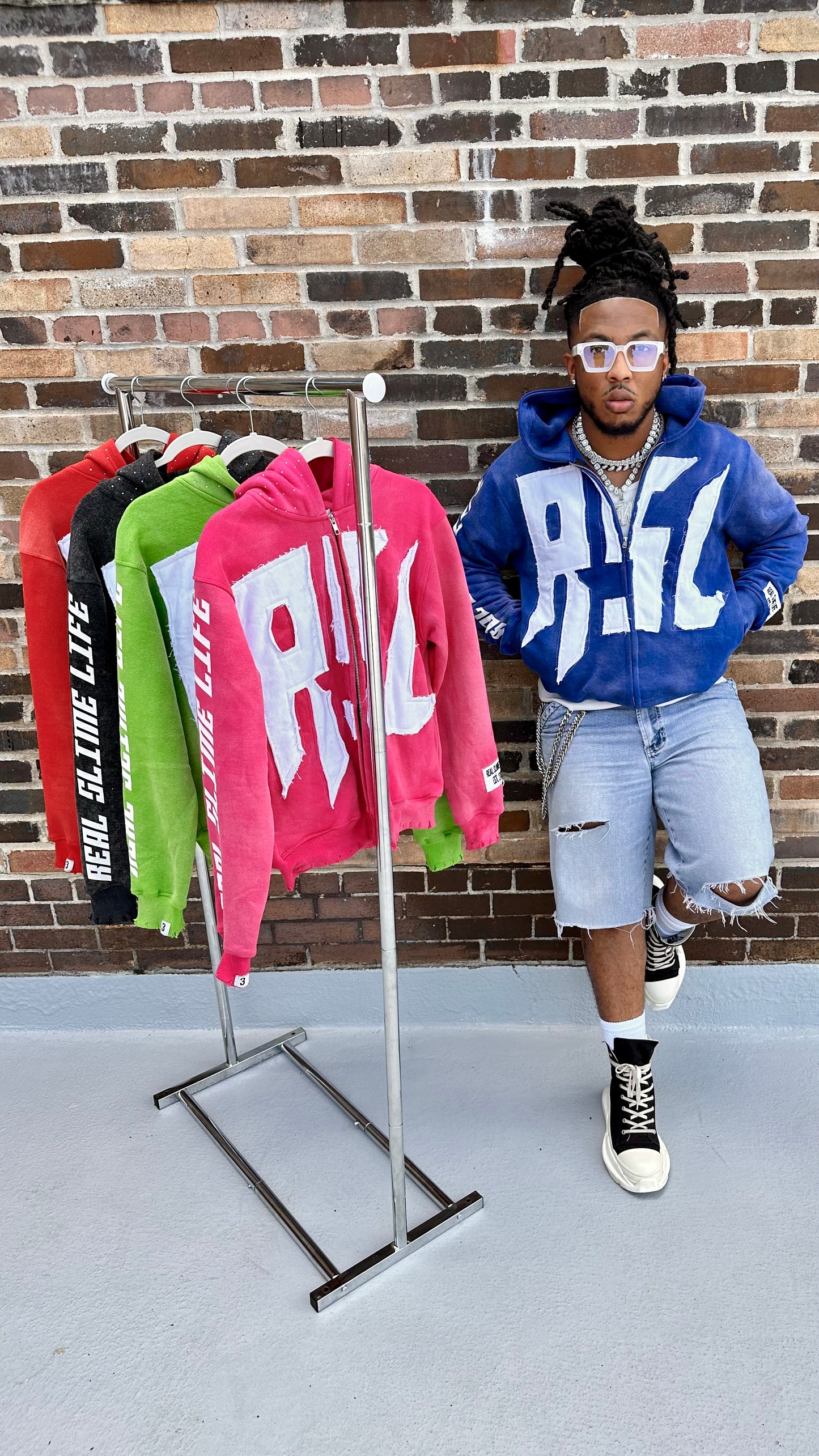 Blue “Members Only” zip-up