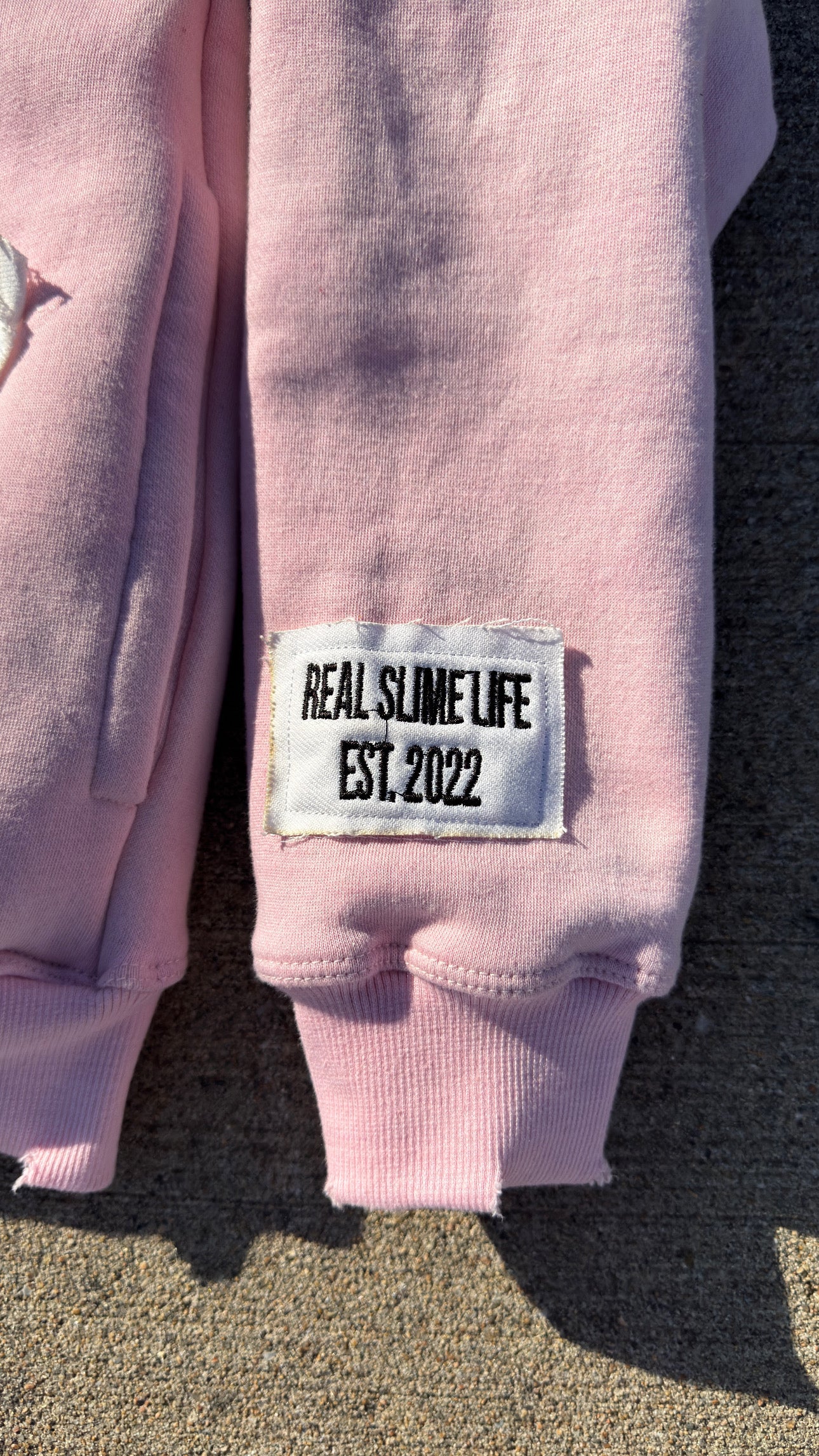 Pink “Members Only” zip-up