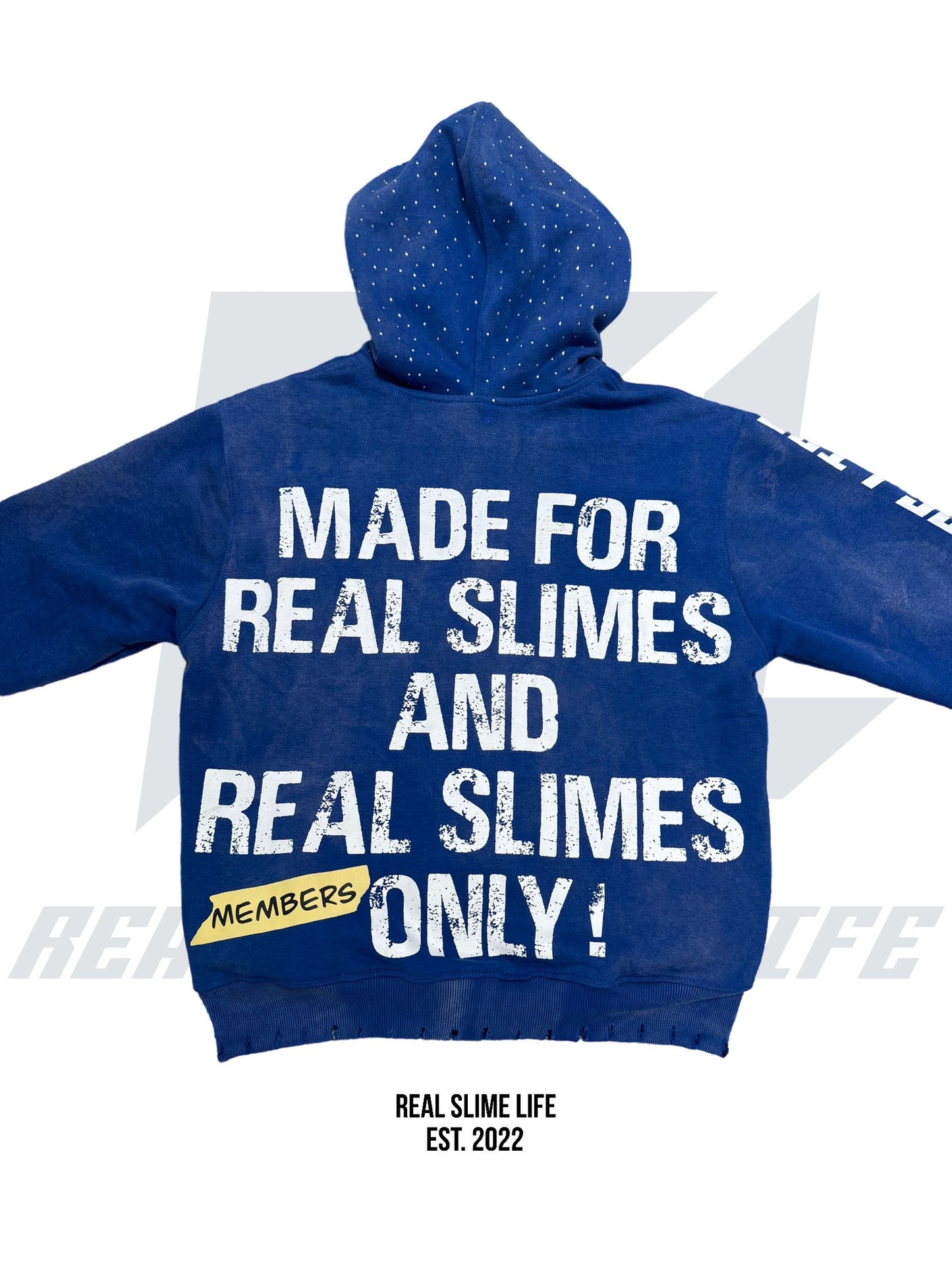 Blue “Members Only” zip-up